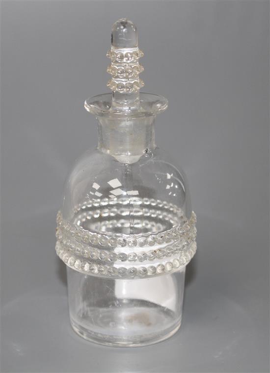 An R. Lalique glass scent bottle and stopper, with beaded decoration, etched mark in upper case, height 10.5cm